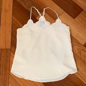 White tank with scalloped top